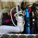 Z12. Hairdryer, curling irons and flat irons. 